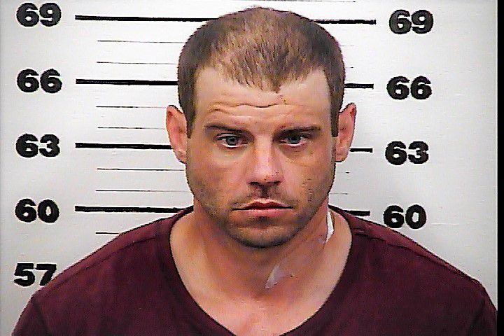 Parking lot police pursuit ends with crash into Hawkins Health Department wall